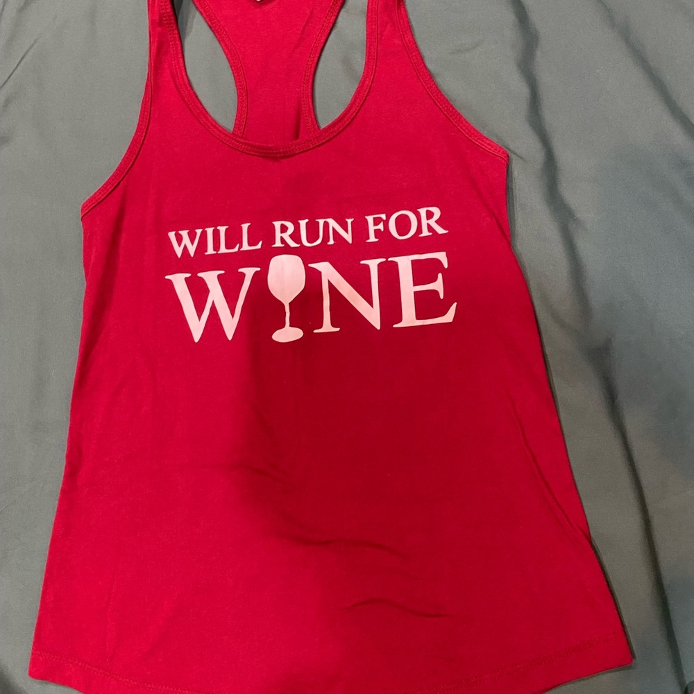 Lot of 2 Disney themed tank tops, Women’s Small. One wine colored, one white.
